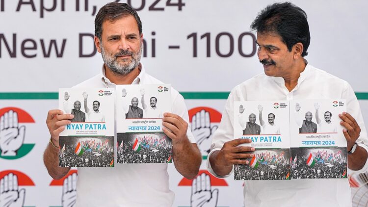New Delhi: Congress leaders Rahul Gandhi and KC Venugopal during the release of the party's manifesto ahead of Lok Sabha elections, in New Delhi, Friday, April 5, 2024. (PTI Photo/Ravi Choudhary)(PTI04_05_2024_000050A)