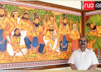 വടവള്ളിയിലെ ചുമര്‍ച്ചിത്രത്തിന് മുന്നില്‍ ചിത്രകാരന്‍ ശശി കെ.വാര്യര്‍