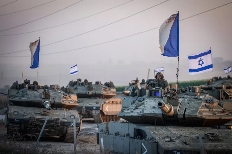 Israeli tanks moving towards Lebanon Border for land invasion