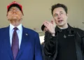 FILE - President-elect Donald Trump listens to Elon Musk as he arrives to watch SpaceX's mega rocket Starship lift off for a test flight from Starbase in Boca Chica, Texas, Nov. 19, 2024. (Brandon Bell/Pool via AP, File)