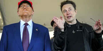 FILE - President-elect Donald Trump listens to Elon Musk as he arrives to watch SpaceX's mega rocket Starship lift off for a test flight from Starbase in Boca Chica, Texas, Nov. 19, 2024. (Brandon Bell/Pool via AP, File)