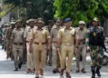 Noida, India- April 12, 2024: Noida Police along with Border Security Force (BSF) personnel during a flag march in the view of the upcoming Lok Sabha elections in sector 31, in Noida, India, on Friday, April 12, 2024. (Photo by Sunil Ghosh / Hindustan Times)