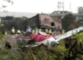 Ahmedabad, Jun 13 (ANI): The wreckage of the ill-fated London-bound Air India flight on the rooftop of the doctors' hostel, in Ahmedabad on Thursday. Efforts are underway to move the wreckage. (ANI Video Grab)