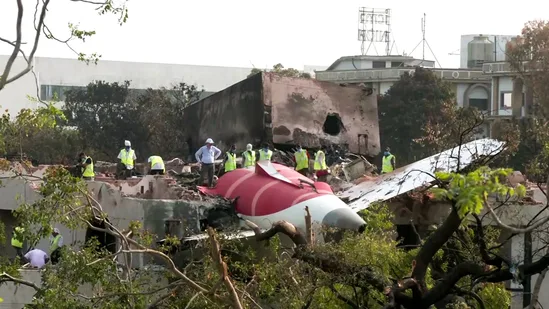 Ahmedabad, Jun 13 (ANI): The wreckage of the ill-fated London-bound Air India flight on the rooftop of the doctors' hostel, in Ahmedabad on Thursday. Efforts are underway to move the wreckage. (ANI Video Grab)