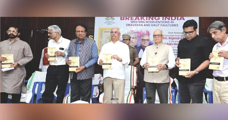 രാജീവ് മല്‍ഹോത്ര, അരവിന്ദന്‍ നീലകണ്ഠന്‍ എന്നിവര്‍ ചേര്‍ന്ന് തയ്യാറാക്കിയ 'ബ്രേക്കിങ് ഇന്ത്യ: വെസ്‌റ്റേണ്‍ ഇന്റര്‍വെന്‍ഷന്‍സ് ഇന്‍ ദ്രവിഡിയന്‍ ആന്‍ഡ് ദളിത് ഫാള്‍ട്ട്‌ലൈന്‍സ്' പുസ്തകത്തിന്റെ മലയാള പരിഭാഷ തിരുവനന്തപുരം ഭാരതീയ വിചാരകേന്ദ്രത്തില്‍ ഗവര്‍ണര്‍ രാജേന്ദ്ര വിശ്വനാഥ് ആര്‍ലേക്കര്‍ പ്രകാശനം ചെയ്യുന്നു. ഹരി എസ്. കര്‍ത്ത, ഡോ. ഭരത് ശ്രീനിവാസന്‍, ഡോ. ടി. പി. ശ്രീനിവാസന്‍, രാജീവ് മല്‍ഹോത്ര, ശ്രീജിത്ത് പണിക്കര്‍, രവീന്ദ്രന്‍ തുടങ്ങിയവര്‍ സമീപം