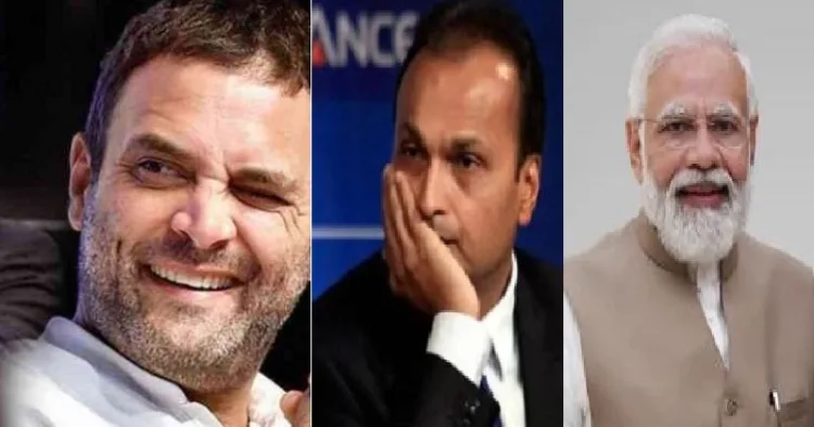 അനില്‍ അംബാനി (നടുവില്‍)