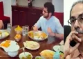 ഉദ്ധവ് താക്കറെ (വലത്ത്) മകന്‍ ആദിത്യ താക്കറെയും ഫുഡ് റൈറ്ററും എഴുത്തുകാരനും  ടെലിവിഷൻ താരവുമായ കുനാൽ വിജയ് കറും വിഭവസമൃദ്ധമായ തീന്‍മേശയില്‍ ഭക്ഷണവും കഴിച്ച് ഹിന്ദിയില്‍ സംസാരിക്കുന്നു (ഇടത്ത്)