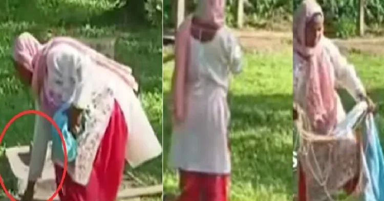 സ്കൂള്‍ പ്രിന്‍സിപ്പലായ ഫാത്തിമ സ്വാതന്ത്ര്യപ്പതാക പാദങ്ങളും കാല്‍മുട്ടും ഉപയോഗിച്ച് മടക്കുന്നു