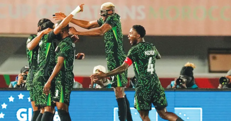 ടൂണീഷ്യയ്‌ക്കെതിരായ പോരാട്ടത്തില്‍ ഗോള്‍ നേട്ടം ആഘോഷിക്കുന്ന നൈജീരിയന്‍ താരങ്ങള്‍