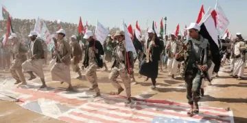 അമേരിക്കയുടെ പതാകയില്‍ ചവുട്ടി കുതിയ്ക്കുന്ന യെമനിലെ ഹൂതി ഭീകരര്‍