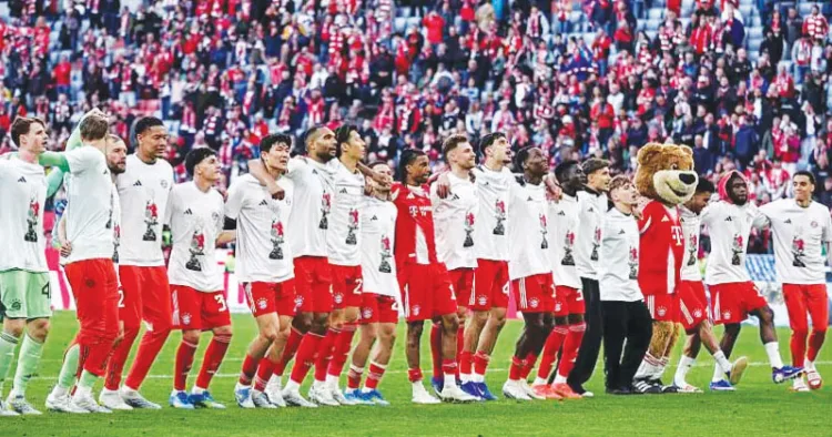 ജര്‍മന്‍ ബുന്ദെസ്‌ലിഗ കിരീടം ഉറപ്പിച്ച ബയേണ്‍ താരങ്ങള്‍ മ്യൂണിക് സ്റ്റേഡിയത്തില്‍ നടത്തിയ ആഹ്ലാദ പ്രകടനം