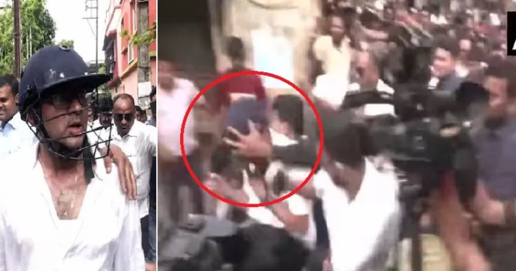 മമതയുടെ മരുമകന്‍ അഭിഷേക് ബാനര്‍ജിക്ക് നേരെ ആക്രോശിക്കുന്ന നാട്ടുകാര്‍. ഹെല്‍മെറ്റ് ധരിച്ച അഭിഷേക് ബാനര്‍ജി ചുവന്ന വളയത്തിനുള്ളില്‍ (വലത്ത്) ഹെല്‍മെറ്റ് ധരിപ്പിച്ച് അഭിഷേക് ബാനര്‍ജിയെ പുറത്തേക്ക് സുരക്ഷാ ഉദ്യോഗസ്ഥര്‍ രക്ഷിച്ചുകൊണ്ടുപോകുന്നു (ഇടത്ത്)