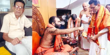 കാശി മഠാധിപതി സ്വാമി സംയമീന്ദ്രതീര്‍ത്ഥ വിശ്വനാഥ പ്രഭുവിനെ ആദരിക്കുന്നു