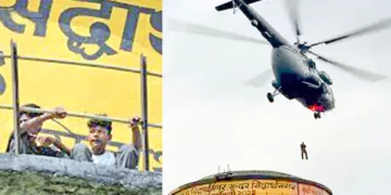 വാട്ടര്‍ ടാങ്കിന് മുകളില്‍ കുടുങ്ങിയ പവന്‍, കല്ലു എന്നിവര്‍, കുടുങ്ങിയ കുട്ടികളെ രക്ഷിക്കാനെത്തിയ എന്‍ഡിആര്‍എഫ് സംഘം ഹെലികോപ്ടറില്‍നിന്ന് പുറത്തിറങ്ങുന്നു