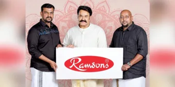 ലോഗോ പ്രകാശന ചടങ്ങില്‍ നടന്‍ മോഹന്‍ലാലിനൊപ്പം റാംസണ്‍സ് എംഡി പ്രവീണ്‍ കുമാര്‍ (ഇടത്ത്)