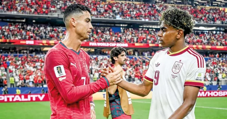 മത്സരശേഷം പോര്‍ച്ചുഗലിന്റെ ക്രിസ്റ്റിയാനോ റൊണാള്‍ഡോയും സ്‌പെയിന്റെ ലാമിന്‍ യമാലും പരസ്പരം കൈകോര്‍ത്ത് ആശംസകള്‍ പങ്കുവയ്ക്കുന്നു