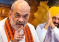 പഞ്ചാബിലെ ആം ആദ്മി മുഖ്യമന്ത്രി ഭഗ് വന്ത് മാന് (പിന്നില്)
