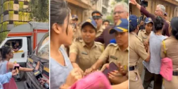 ഒക്ടോബര്‍ 10ലെ ജന്തര്‍മന്തര്‍ മാര്‍ച്ചില്‍ പൊലീസ് വാഹനം തടയാന്‍ ശ്രമിച്ച സ്ത്രീയെ ദല്‍ഹി പൊലീസ് കസ്റ്റഡിയില്‍ എടുക്കുന്നു
